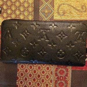 Louis Vuittion Zippy Wallet in Empreinte Leather
